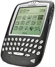 Photo of an old black and white BlackBerry.