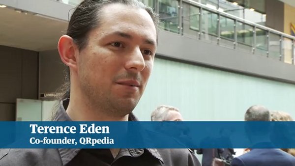 Photo of Terence Eden captured from a video. His name is spelled correctly in the strap line.