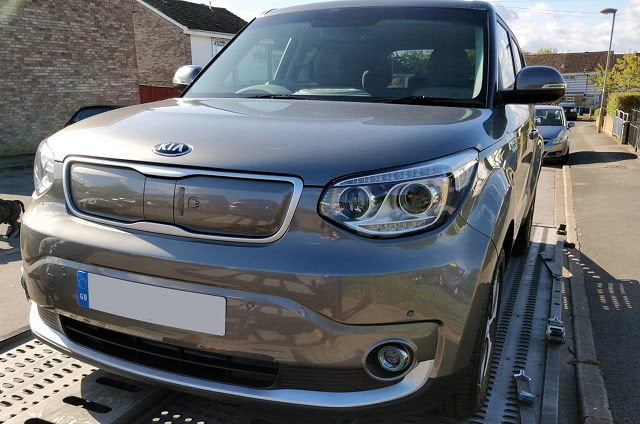 A grey coloured car.