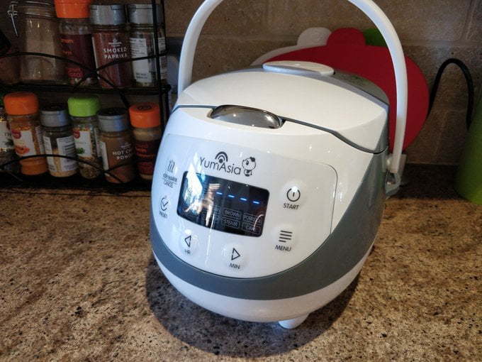Rice cooker which looks a bit like a panda.