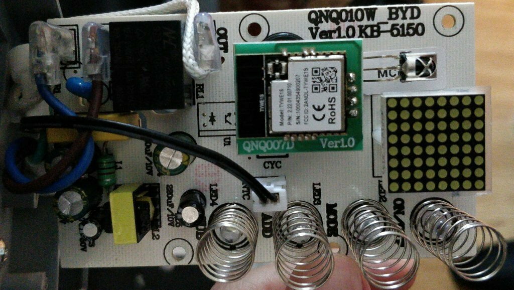 A circuit board with springs.